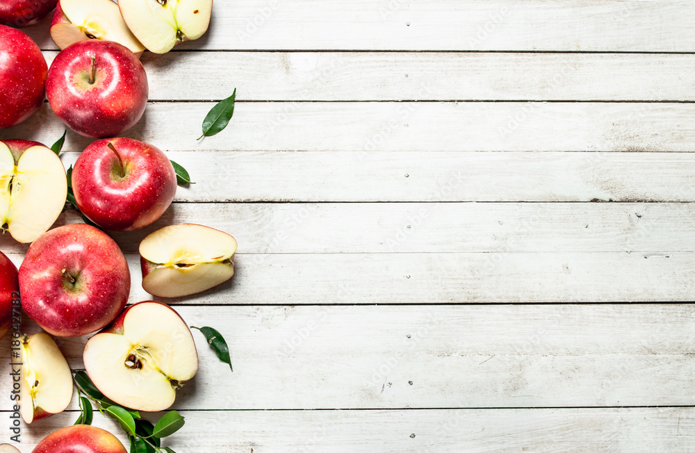 Fresh red apples with leaves. Fresh red apples with leaves.