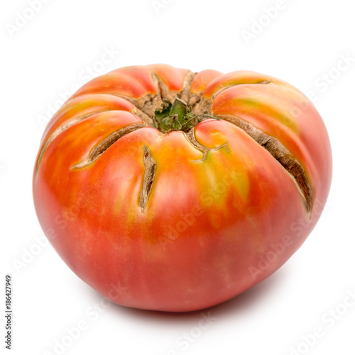 big ripe red tomato vegetable is isolated on white background