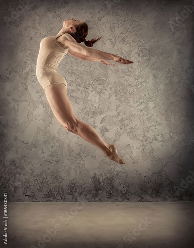 Fototapeta Naklejka Na Ścianę i Meble -  Two person, dancers, woman and man in dynamic jump action  heart