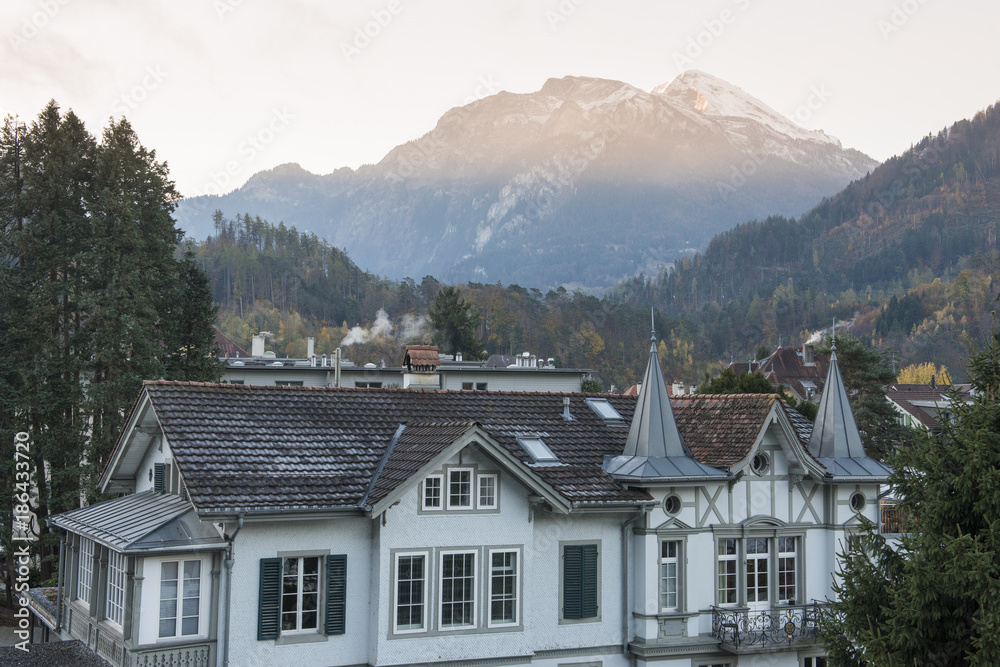 Interlaken,Switzerland. 31 October 2017 : Old Swiss House in old town area  Interlaken with Mountain.