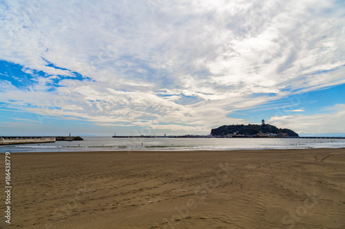 Enoshima and the ocean.Shooting location is Shichirigahama Kamakura, Kanagawa Prefecture Japan. photo