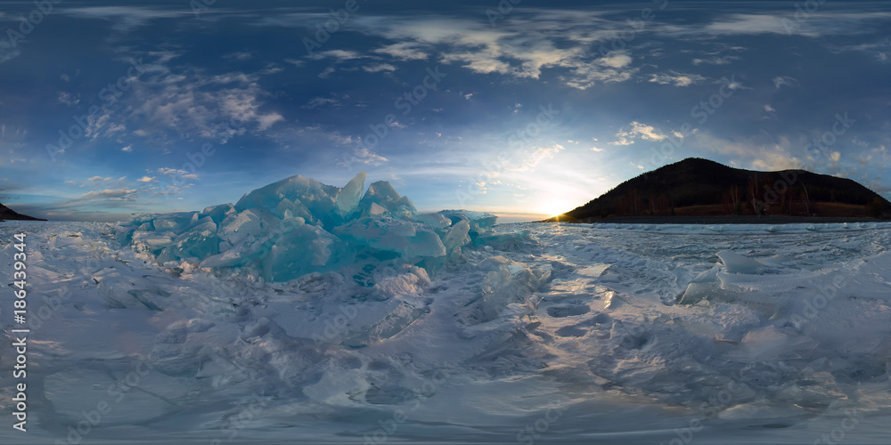 Woman in blue hummocks of the ice Baikal at sunset. Spherical vr 360 180 degrees panorama