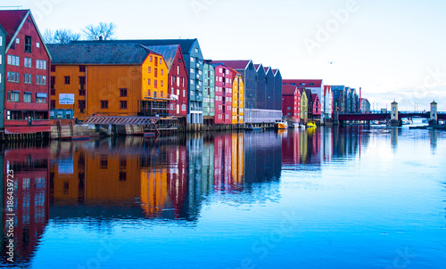 Bright buildings and beautiful reflections on the waterfront at Trondheim, Norway