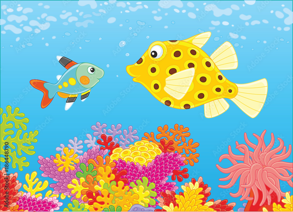 Naklejka premium A funny boxfish and an x-ray fish swimming in blue water over an amazing colorful coral reef in a tropical sea, a vector illustration in cartoon style