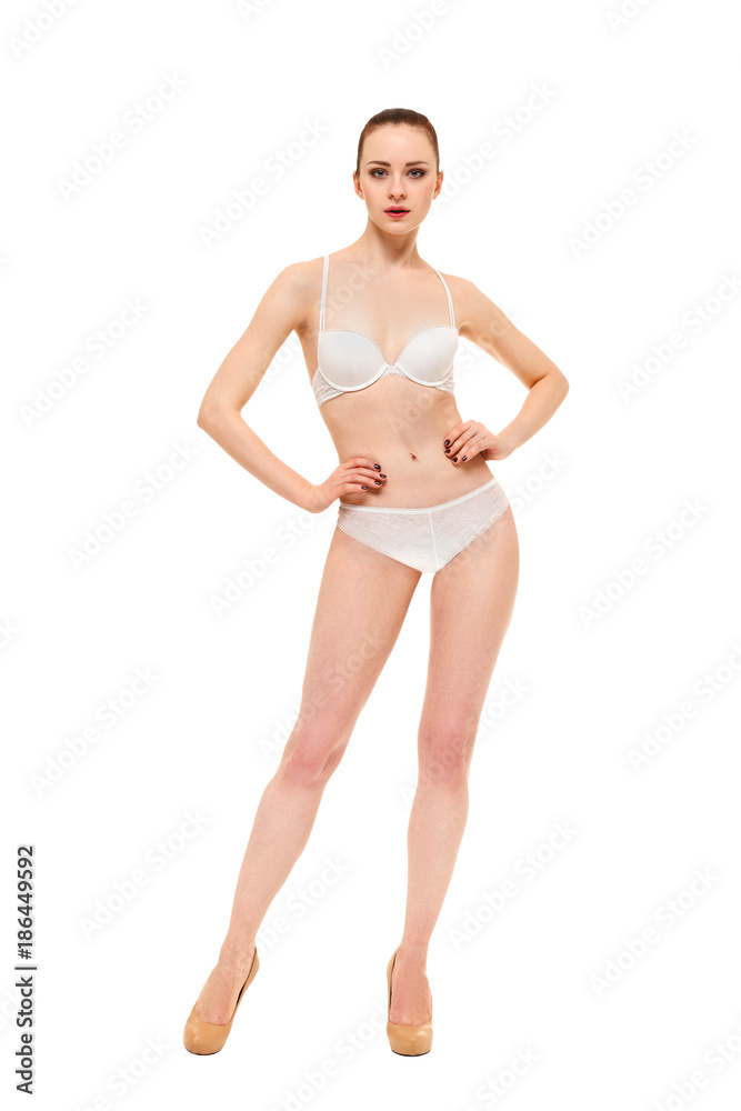 Beautiful underwear model posing on a white background Beautiful underwear model posing on a white background