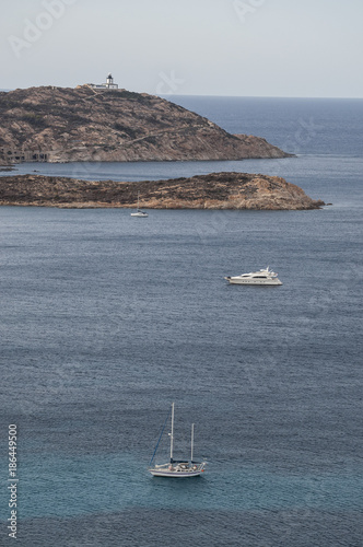 Corsica, 03/09/2017: Punta di Revellata, il promontorio lungo la costa nord occidentale dell'isola, a ovest della città di Calvi, con vista del faro di Revellata, faro marittimo inaugurato nel 1844 photo