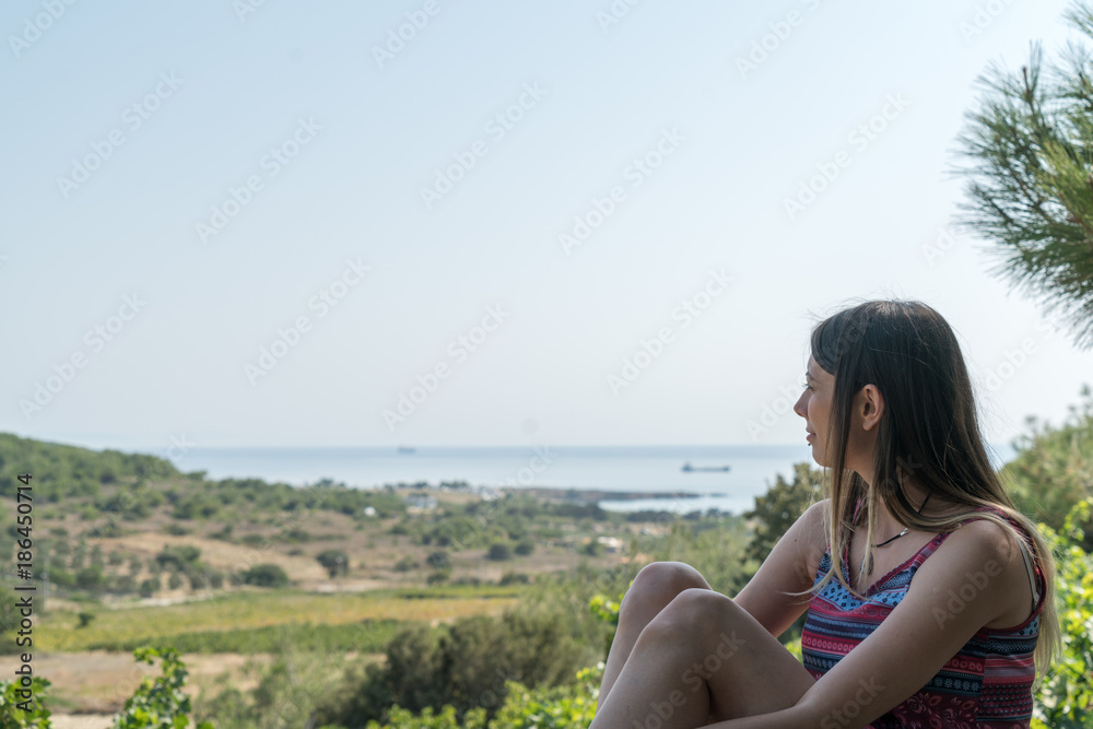 Female Sits Near By Valley at Summer Time Phone Bozcaada in Canakkale Turkey 2017