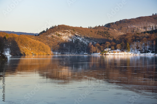 Fototapeta Naklejka Na Ścianę i Meble -  Frozen Lake Rursee Reflections, Germany