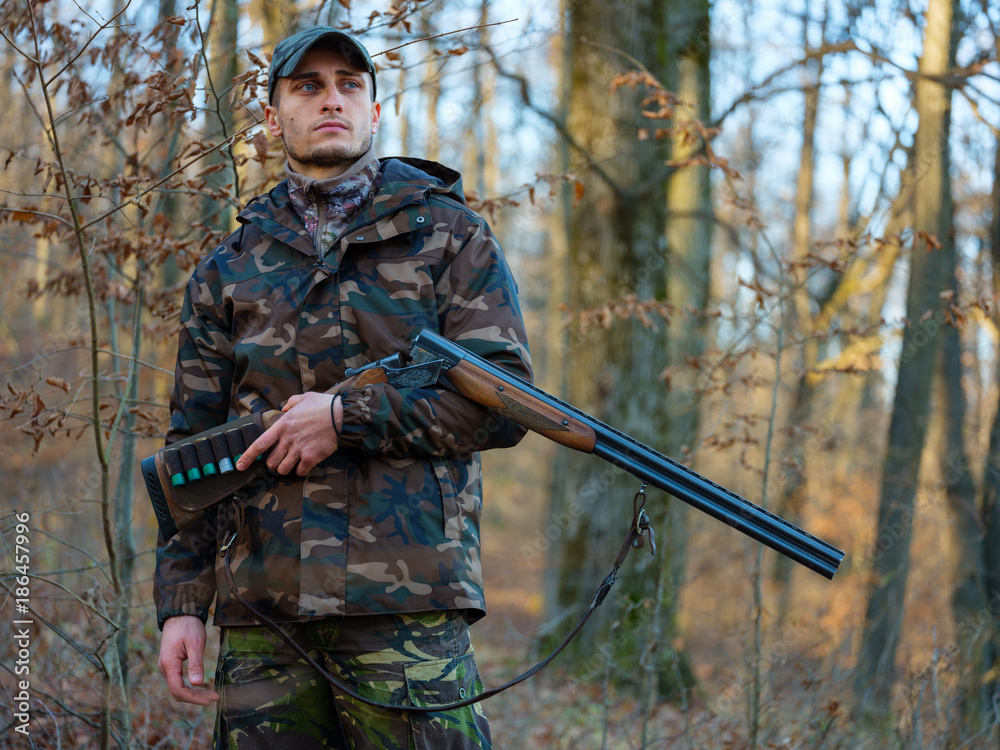Fototapeta premium Hunter with shotgun