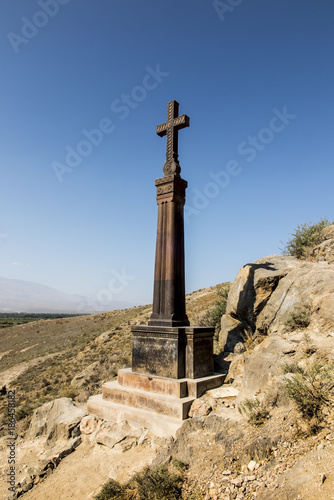 Old cross on the hill above the Khor Virap monastery in Armeni. photo