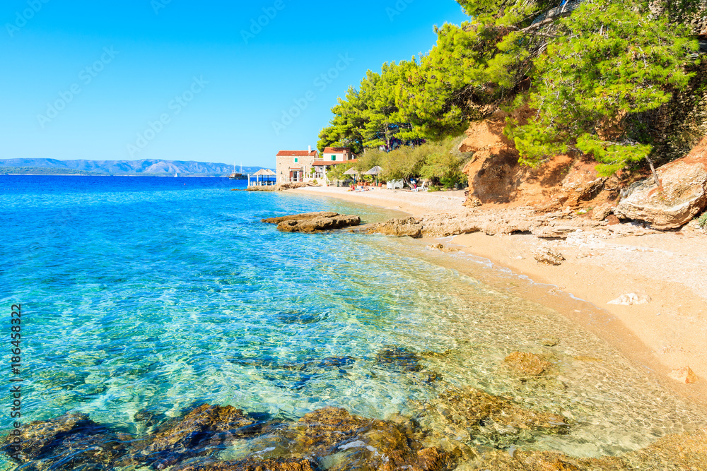 Fototapeta premium Idyllic beach on coast of Brac island near Bol town, Brac island, Croatia