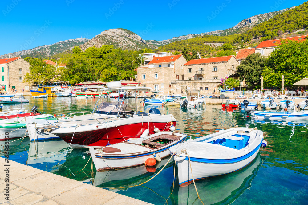 View of Bol port with boats on sunny summer day, Brac island, Croatia