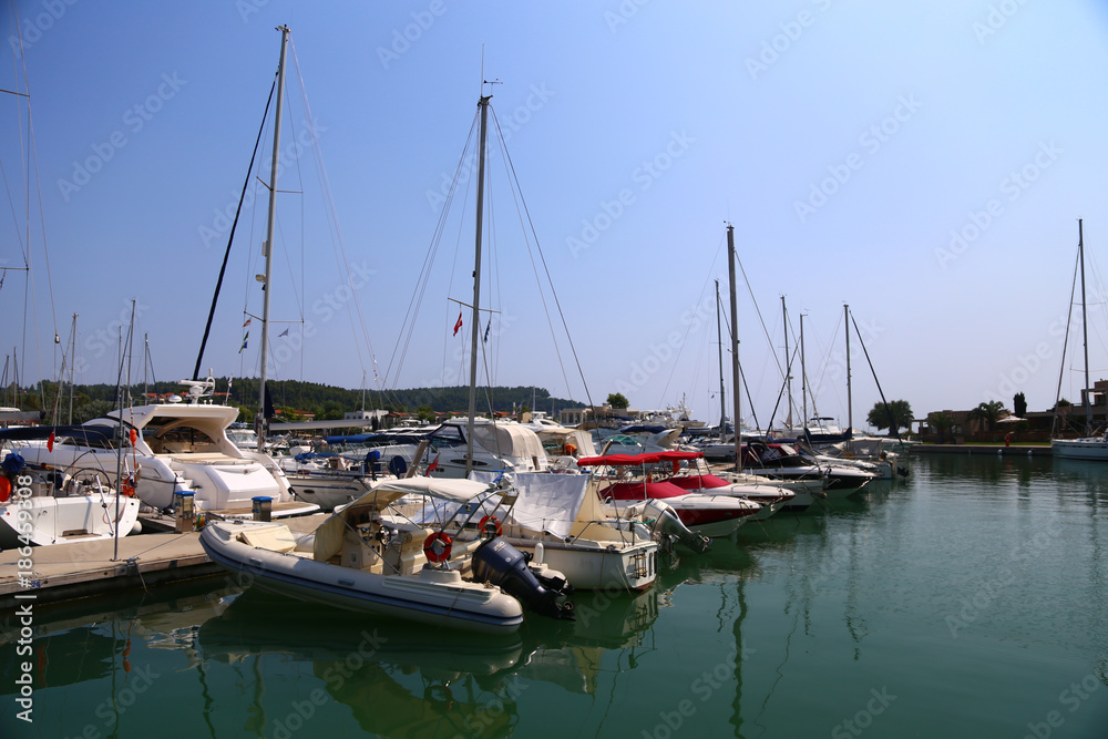 Marina with parked yachts and boats in Halkidiki Sithonia Marina with parked yachts and boats in Halkidiki Sithonia