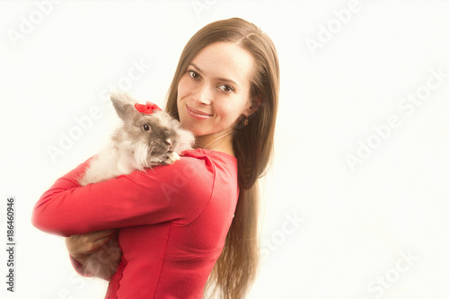 rabbit with cute girl on white background