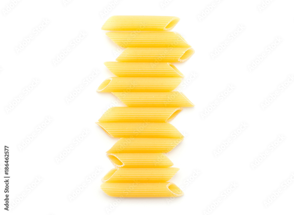 Penne rigate in line top view isolated on white background dry raw pasta pieces. Penne rigate in line top view isolated on white background dry raw pasta pieces.
