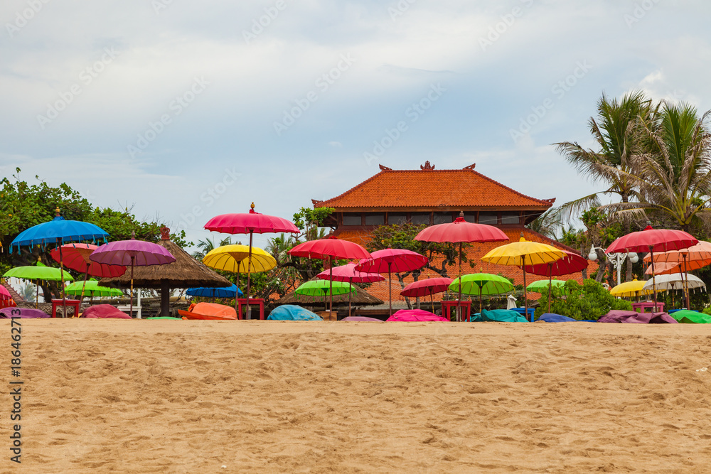 Sun umbrellas at Nusa Dua beach, Bali island, Indonesia