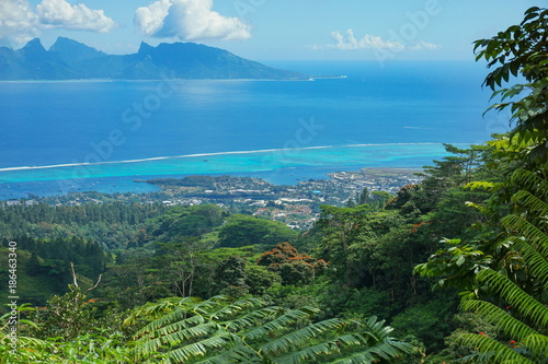 View from the mountains of the north-west coast of Tahiti with Moorea island in background, French Polynesia, south Pacific ocean