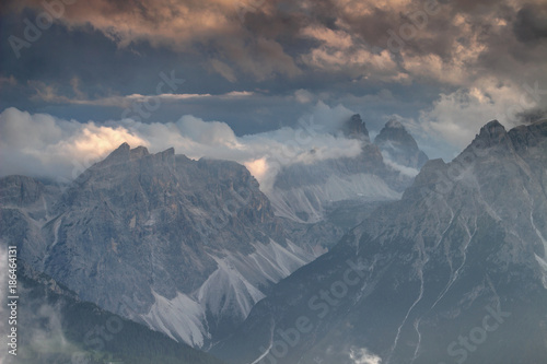 Sesto Dolomiti Sextner Dolomiten in evening sunlit clouds with Val Fiscalina Fischleintal valley, Tre Cime Drei Zinnen, Cima Una Einserkofel, Monte Paterno Paternkofel peaks South Tyrol Italy Europe