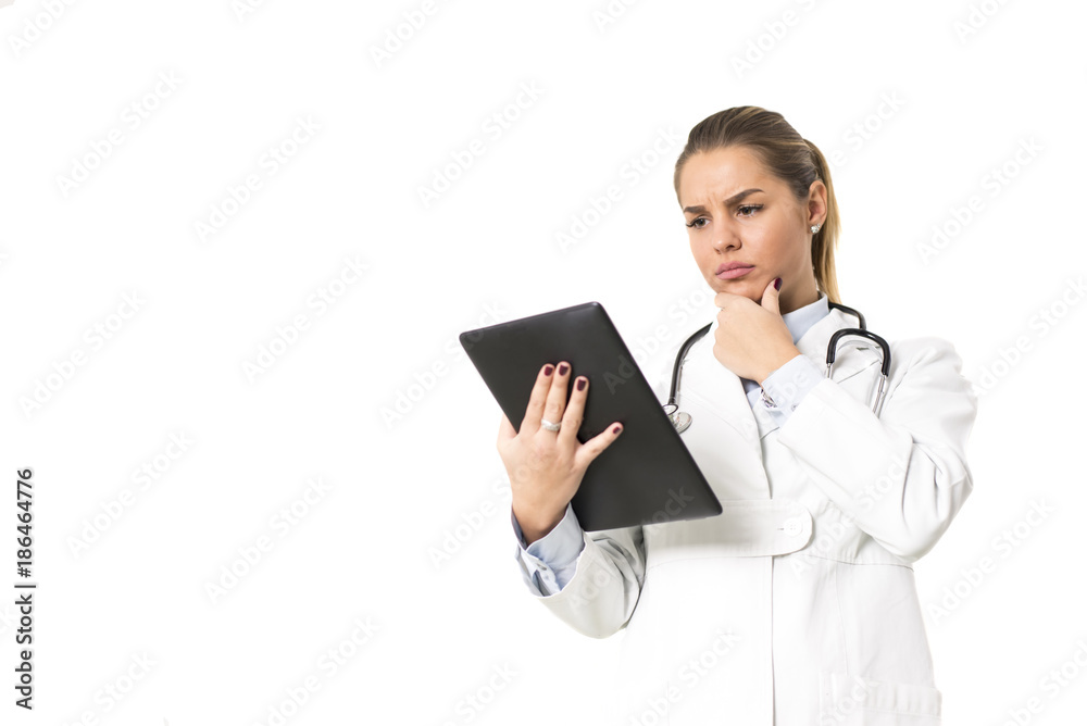 Young female doctor using digital tablet Young female doctor using digital tablet