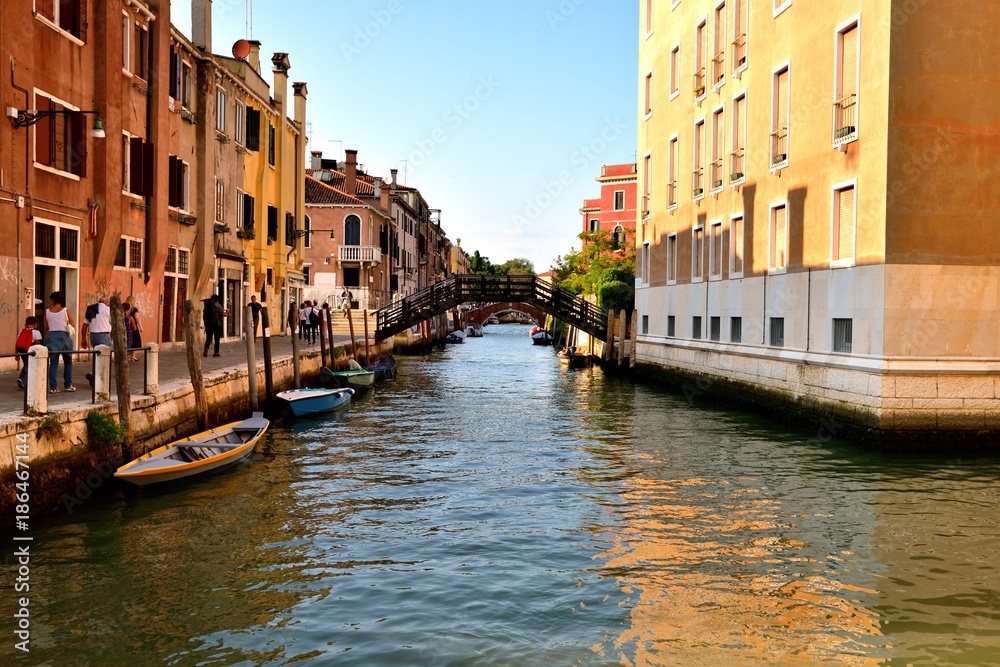 Toursits and the canal of Venice