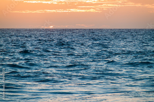 Fototapeta Naklejka Na Ścianę i Meble -  Sunset at a rough sea