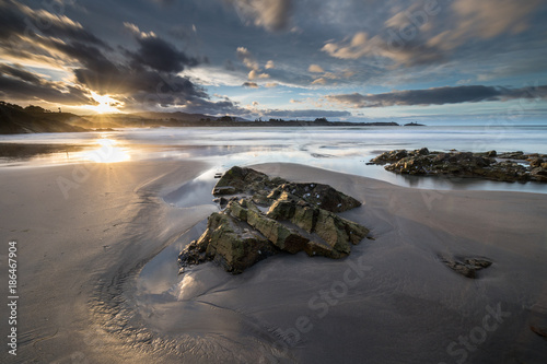 Reflections on the beach of Arnao! photo