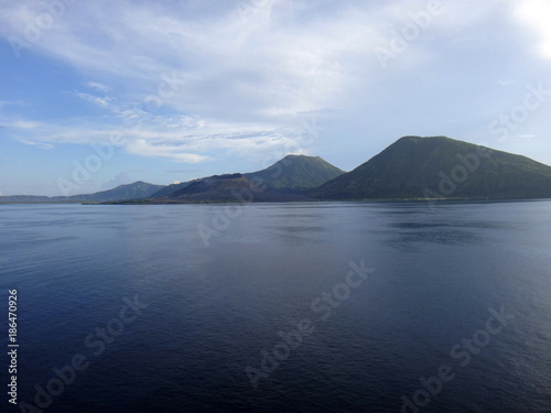 Scene of Simpson Harbour and Rabaul from a cruise ship.