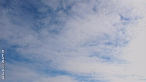 Time-Lapse of Altocumulus Perlucidus clouds covering the Southern skies  photo