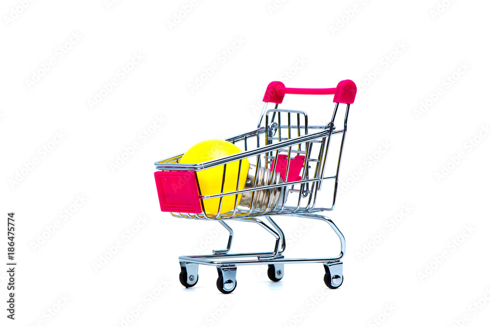 Mini shopping cart or supermarket trolley with yellow tungsten light bulb, isolated on white background, business finance shopping concept.