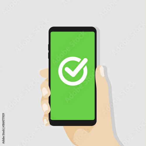 Green checkmark on smartphone screen. Hand holding smartphone. vector