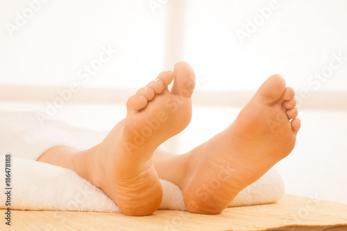 Close-up of female hands doing foot massage © Samo Trebizan