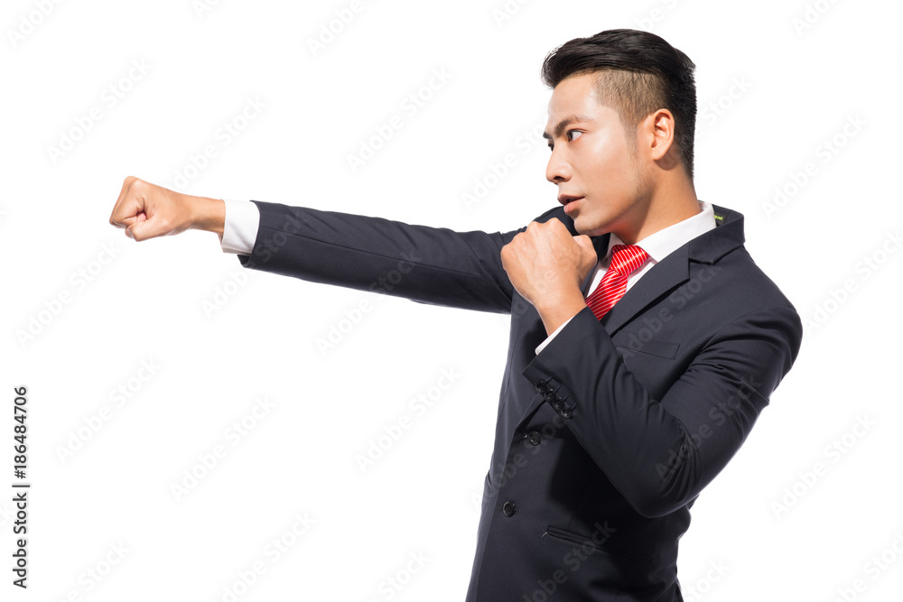 Young asian businessman ready to fight isolated on white Young asian businessman ready to fight isolated on white