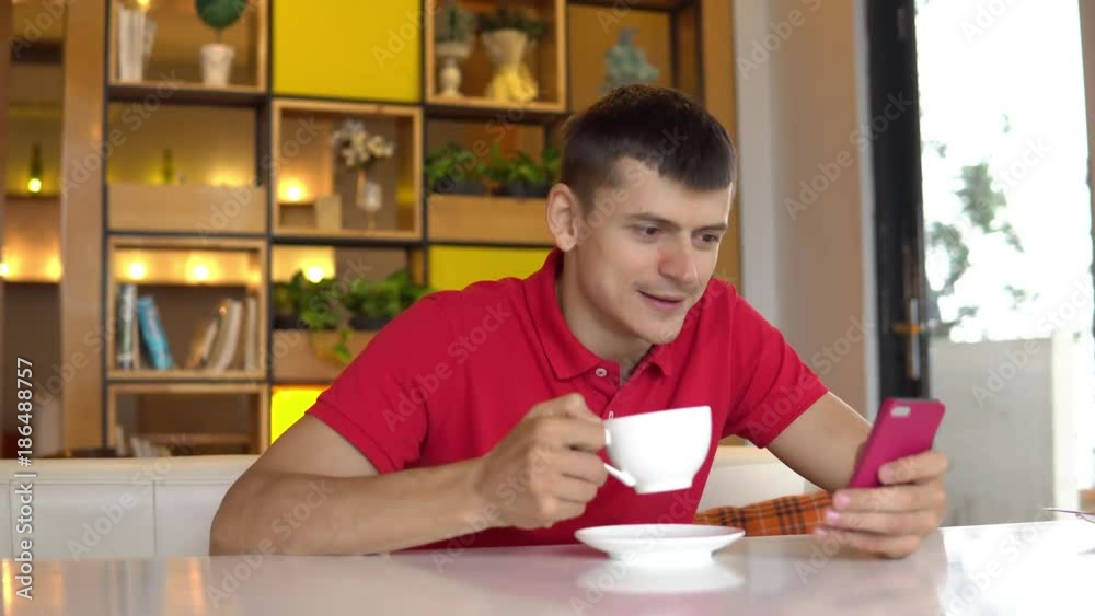 Coffee break. Man chatting with girlfriend while drinking coffee Coffee break. Man chatting with girlfriend while drinking coffee