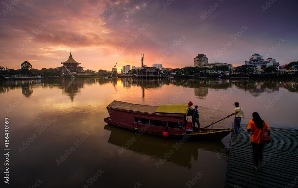 sunrise reflection and boat