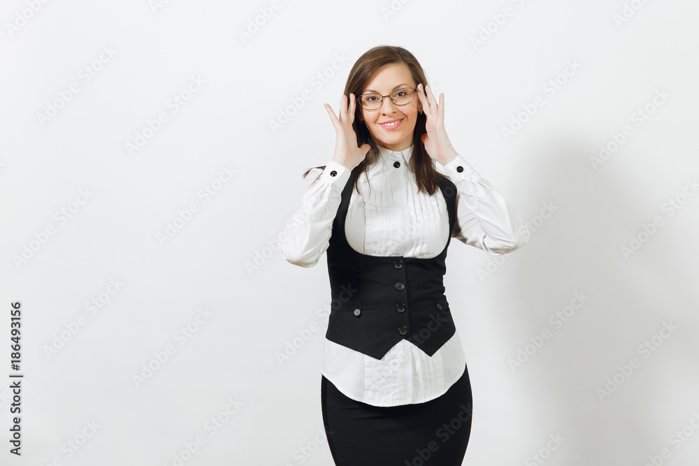 Beautiful happy caucasian young smiling brown-hair business woman in black suit, white shirt, holding correcting glasses isolated on white background. Manager or worker. Copy space for advertisement.