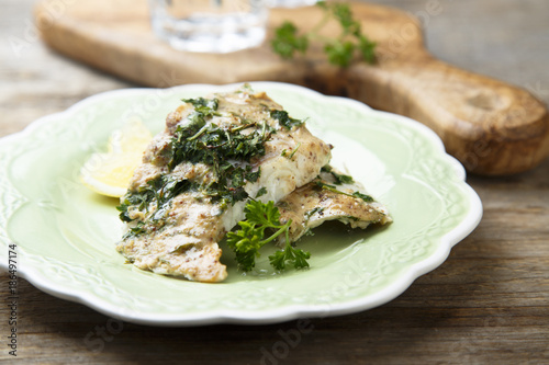 Baked fish with lemond and herbs