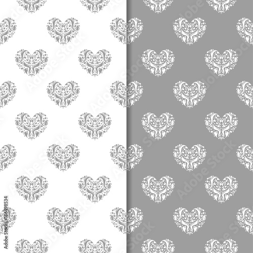 Fototapeta Naklejka Na Ścianę i Meble -  Gray and white hearts as seamless patterns. Set of romantic backgrounds