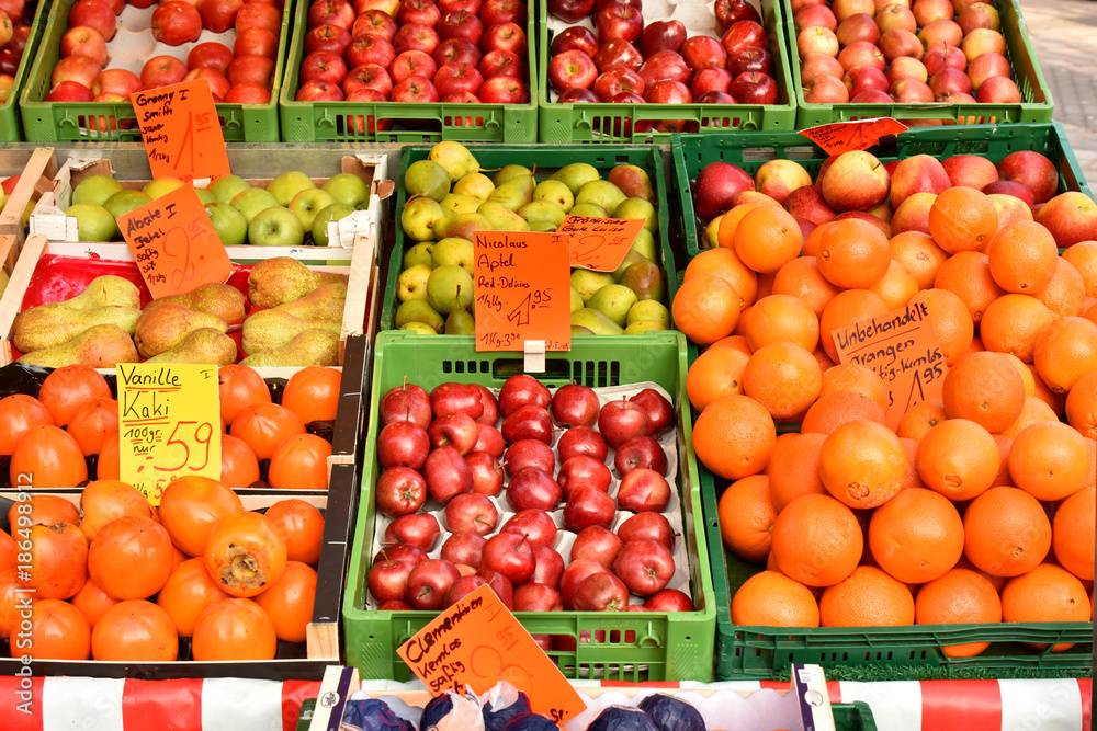 Fruit in the market. Fresh fruit in boxes. Good fruit harvest.