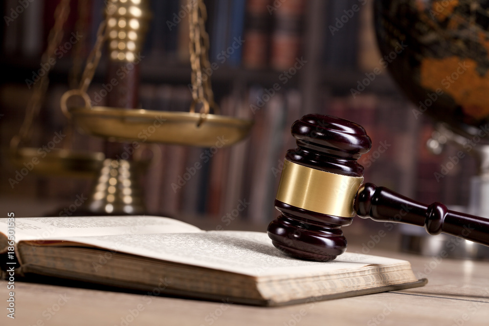 Wooden Judges gavel ,golden scales justice. Law concept Wooden Judges gavel ,golden scales justice. Law concept