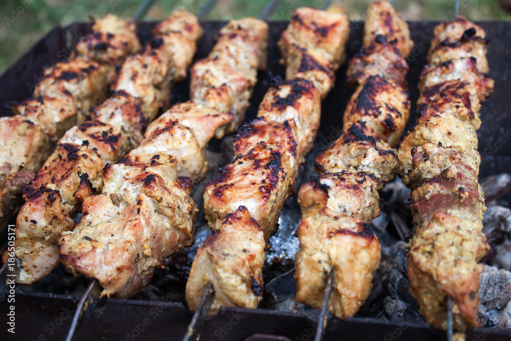 Skewers grilling on a barbecue