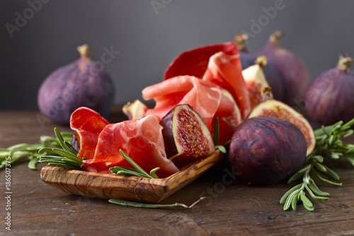 Prosciutto with figs and rosemary.