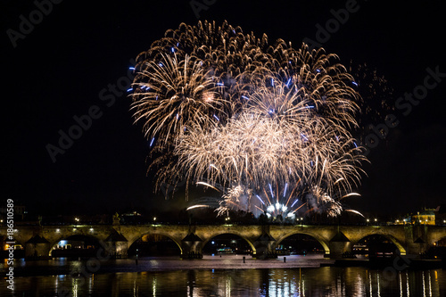 Colorful firework in Prague on New Year celebration photo