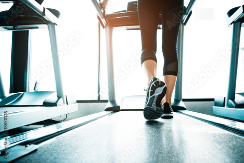 Canvas Print Close up of people who exercising on treadmill