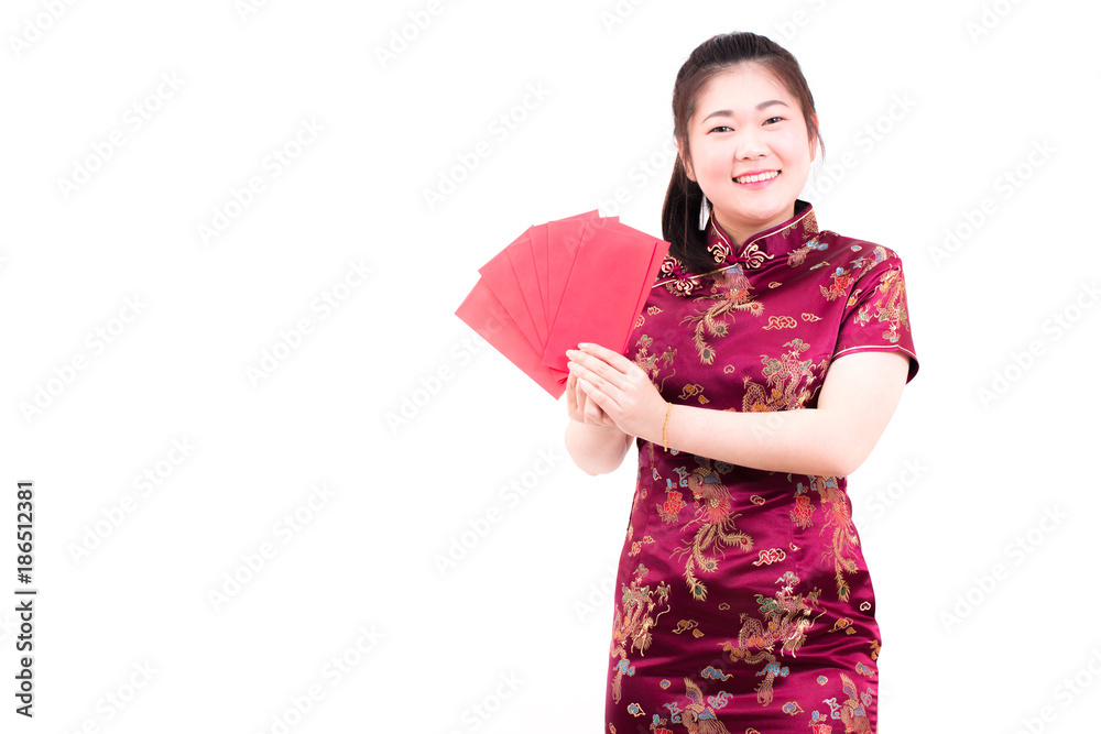 Beautiful asian woman wears cheongsam on white background. Holding red envelopes and smile in chinese new year. Beautiful asian woman wears cheongsam on white background. Holding red envelopes and smile in chinese new year.