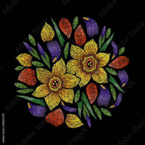 Fototapeta Naklejka Na Ścianę i Meble -  Embroidery circle floral pattern with narcissus and iris petals