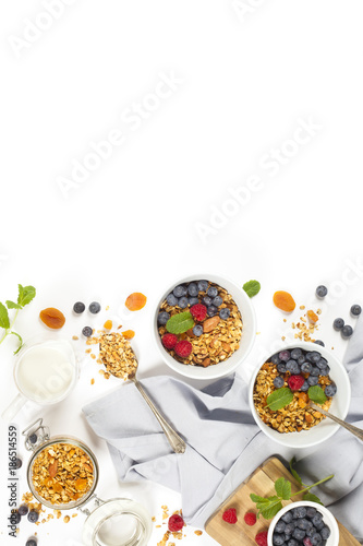 Healthy breakfast -  Homemade granola, honey, milk and berries