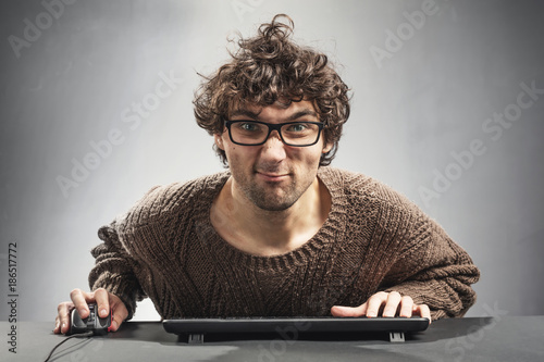 Obraz na płótnie Young man playing game on a computer.