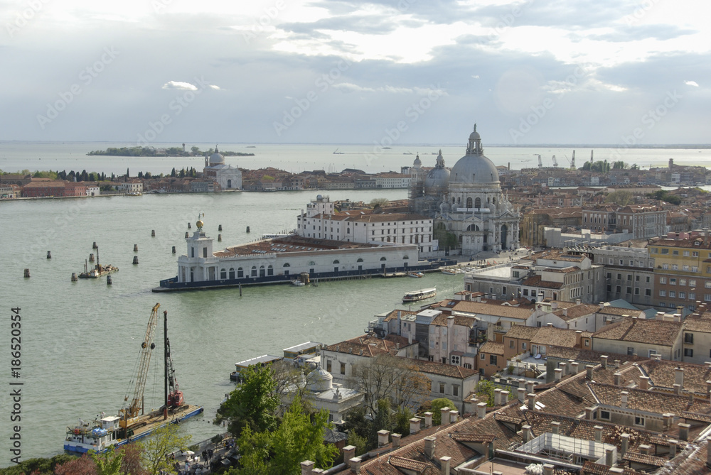 Basilica di Santa Maria della Salute, Grand Canal and lagoon. Aerial view of Venice from San Marco bell tower, Italy.  