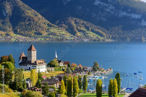 Beautiful landscape of lake Thun in Switzerland during autumn season from Spiez train station photo