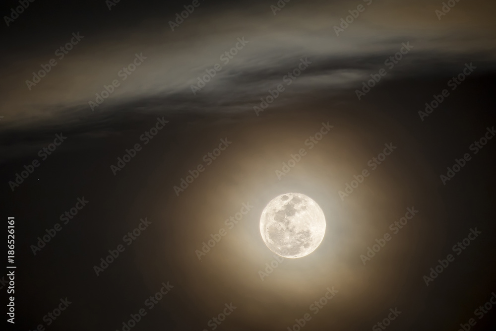 Fototapeta premium Close up of full moon on dark sky background.